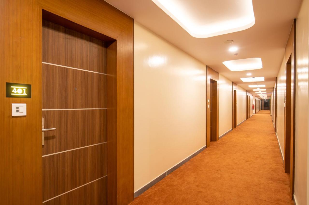 Hotel Palm International Butwāl Eksteriør bilde